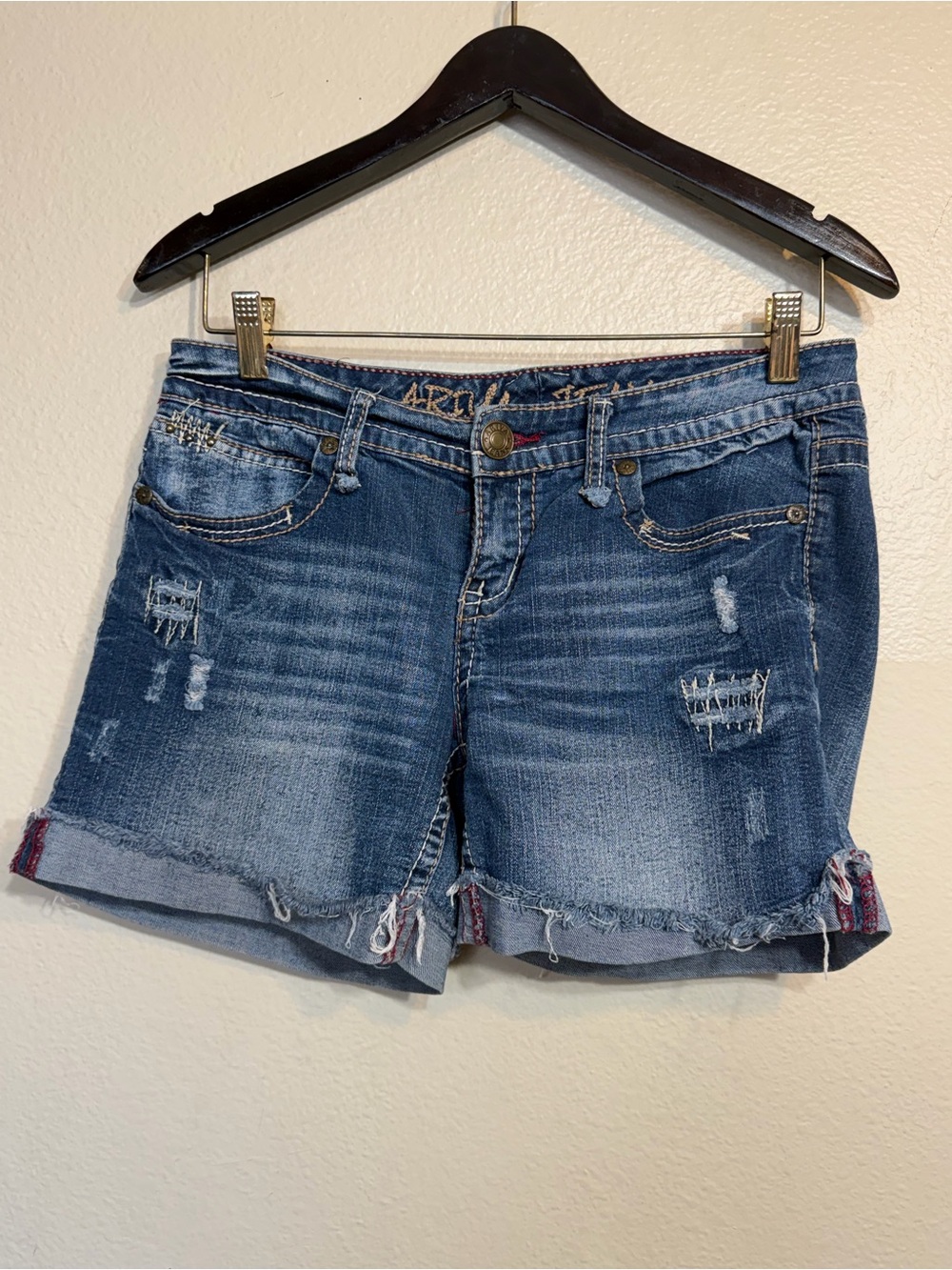 Y2K low-rise Dark Blue Distressed Denim Shorts with embroidered pockets Ariya
